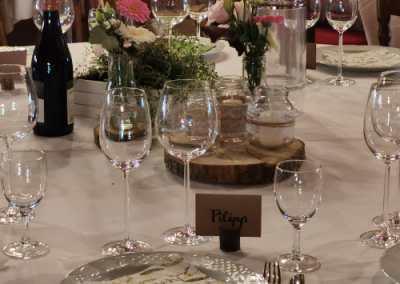wedding table set with wine carafe and plates