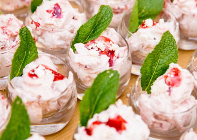 dessert cups with pudding in them on a table