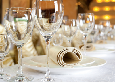 wine glasses ona table white tablecloth